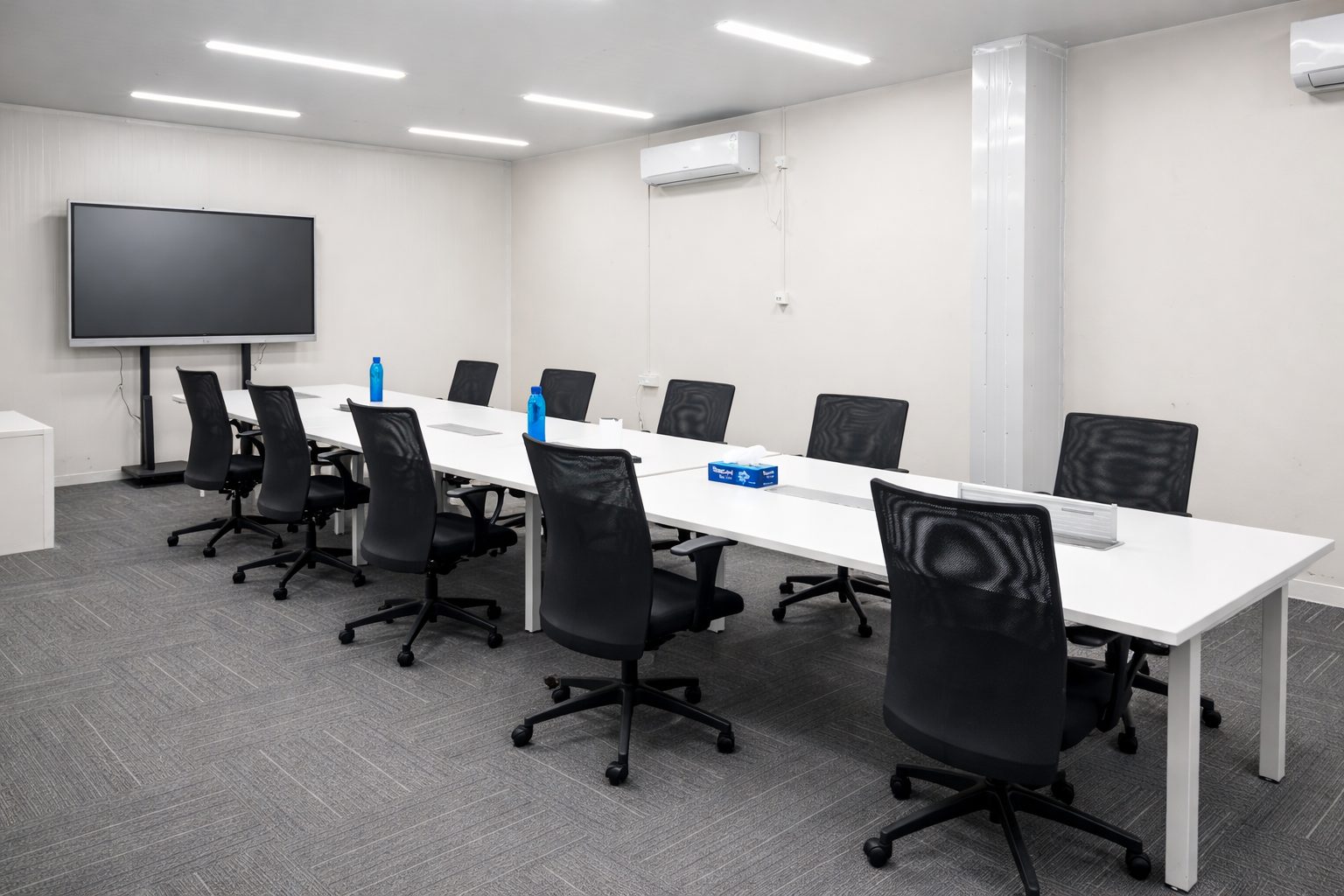 On-site conference room for principal meetings and sales reviews